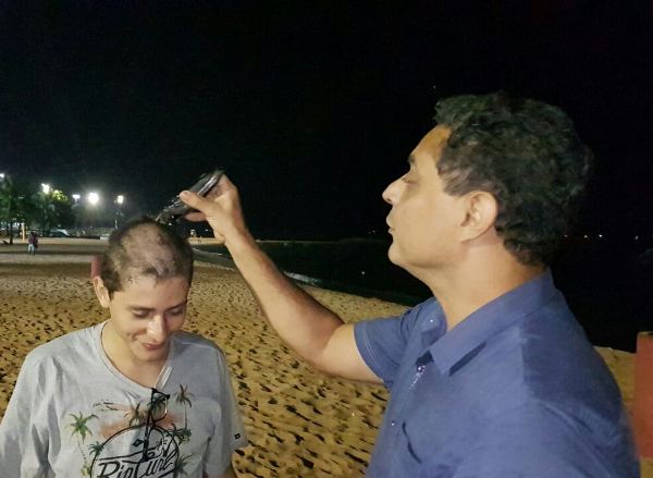 Vai cursar Direito na UFES: Delegado raspa cabeça do filho após quase mil pontos na Redação do Enem