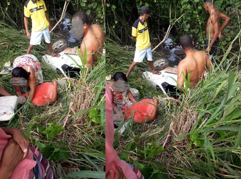 Carro caiu em córrego: Populares socorrem vítima de acidente no bairro Planalto