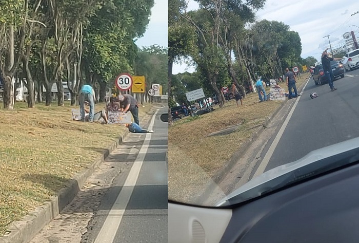 Acidente: Moto e ocupantes caídos em canteiro da BR-101, em Linhares