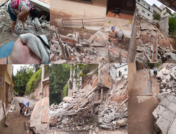 Moradores se desesperam e arregaçam as mangas para retirar concreto de muro desabado na Beira Rio