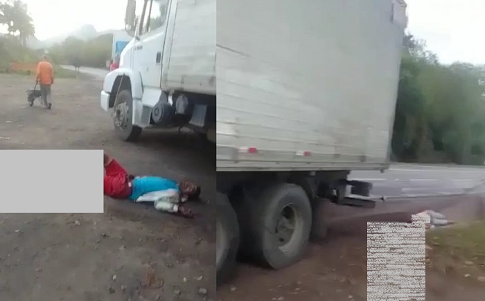 Homem com perna destruída clama por ajuda ao lado de mulher m0rta BR-101