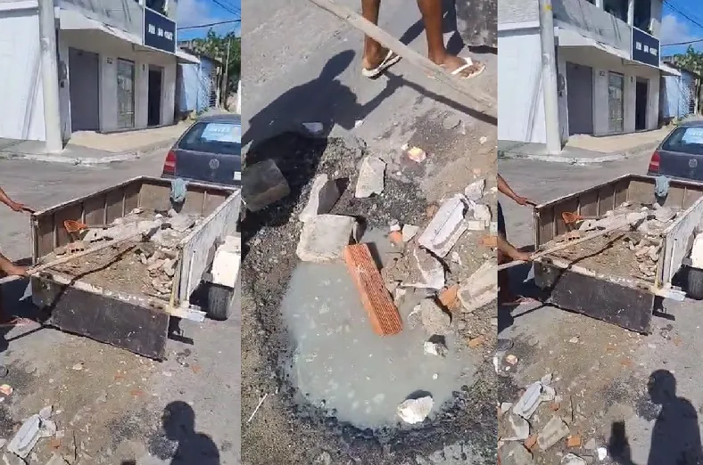 Moradores tapam buracos nas ruas do Santa Cruz, Linhares. “Posta aí”